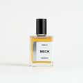 A rectangular glass perfume bottle with a black cap, filled with amber-yellow liquid, featuring a white label with the text 'WANDA vel MECH L'Apothicaire'.